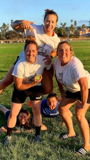 A happy group of rugby players who support Battle Balm all natural organic pain cream for keeping them on the pitch and healthy.