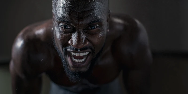 Male athlete catching his breath